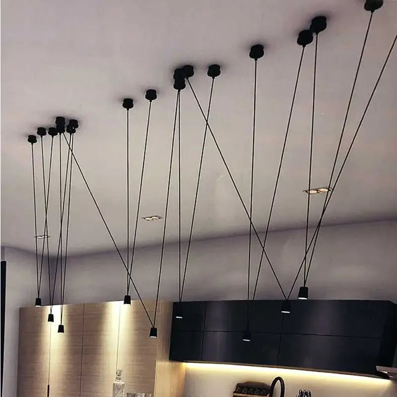 Modern minimalist black geometric vintage linear pendant lamp with sleek design and thin cords for kitchen decorbites geometric vintage decor