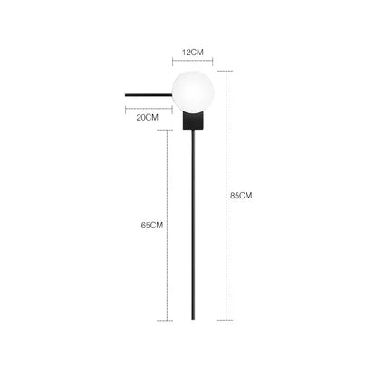 Modern minimalist black metal wall lights with a white glass ball globe for bedroom lighting