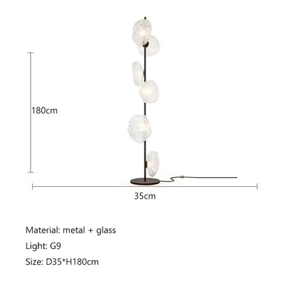 Modern minimalist black floor lamp with slender metal frame and five translucent glass shade led globes for home decor