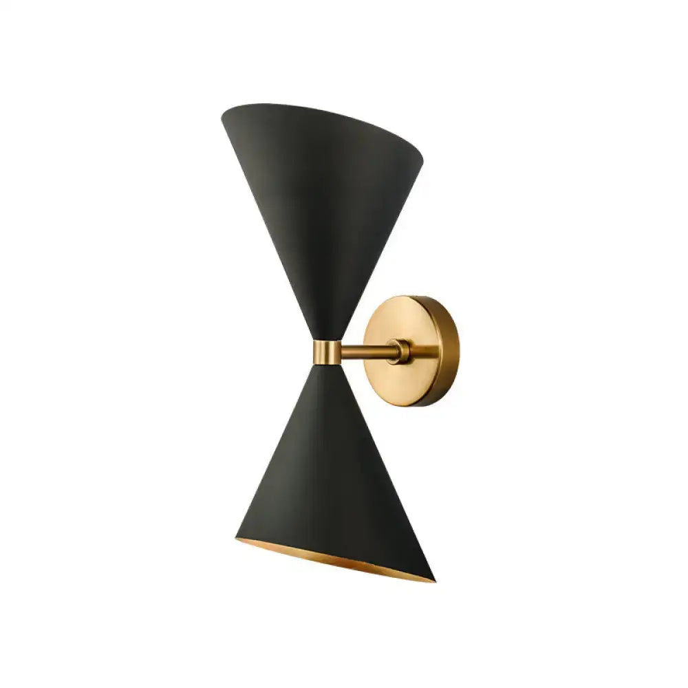 Modern minimalist black matte conical wall light fixture with gold brass accents for bedroom use