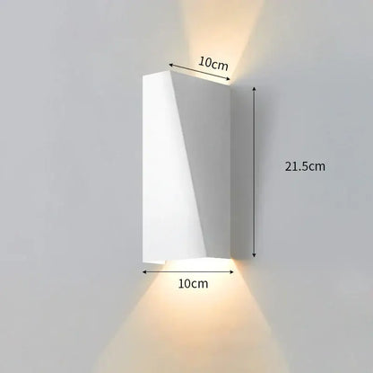 Modern minimalist black led wall lamp with a white rectangular sconce and warm ambient lighting for bedroom reading