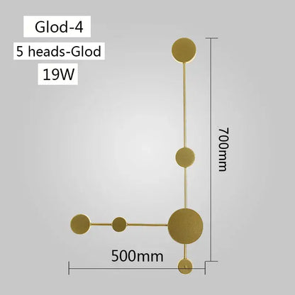 Gold-colored modern led wall lamp with five asymmetrical circular light heads for living space illumination