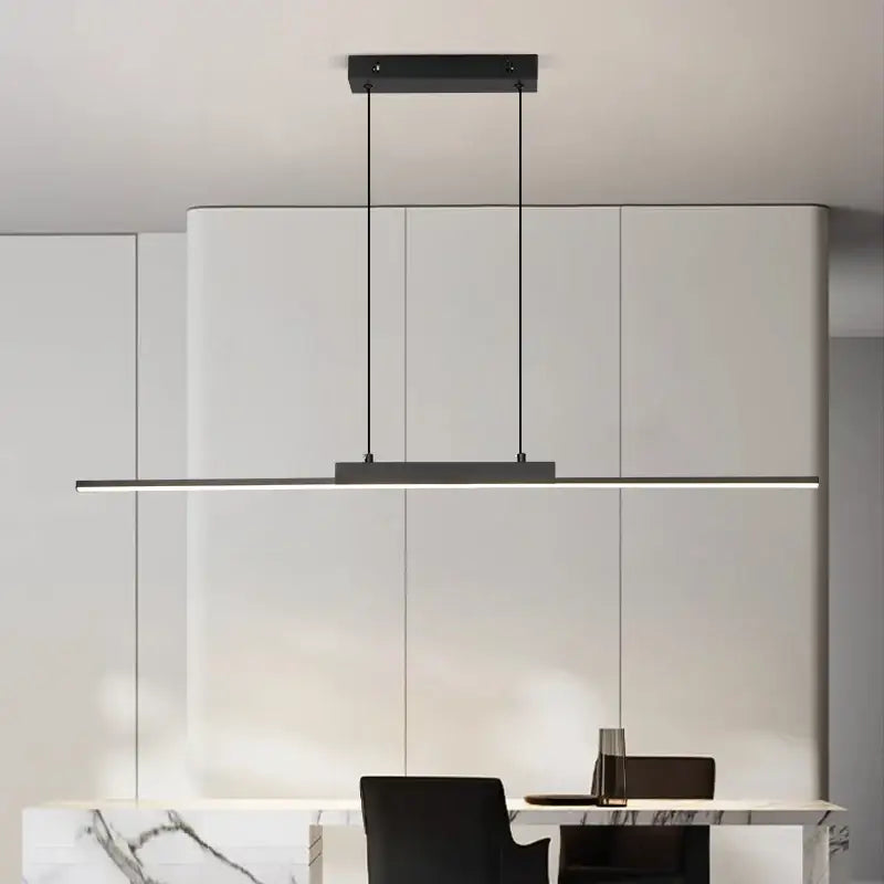 Modern minimalist black linear pendant light with sleek rectangular design and minimalist hanging cables for dining room