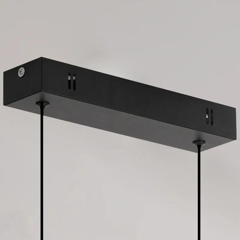 Black rectangular linear pendant light with sleek modern design and matte finish for dining room lighting