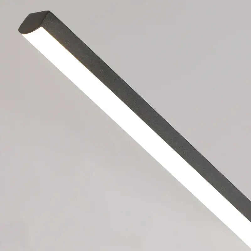 Modern minimalist black linear pendant light with sleek led strip design ideal for dining room lighting
