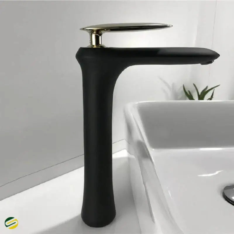 Modern minimalist decorbites black brass bathroom faucet with black matte finish and polished gold-tone spout