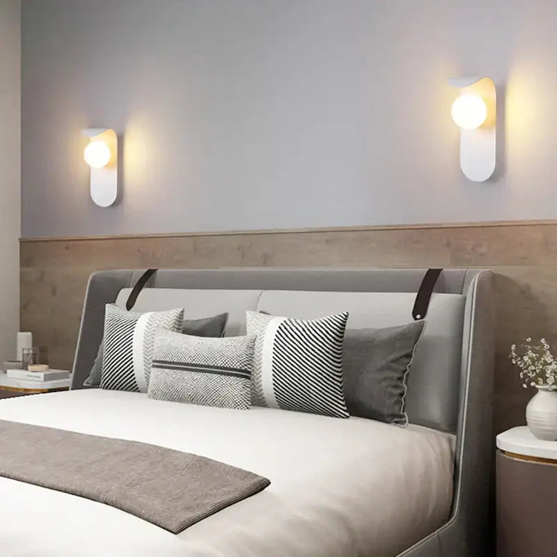 Modern minimalist black and white frosted glass ball led wall lamp with sleek white wall sconces for bedroom lighting
