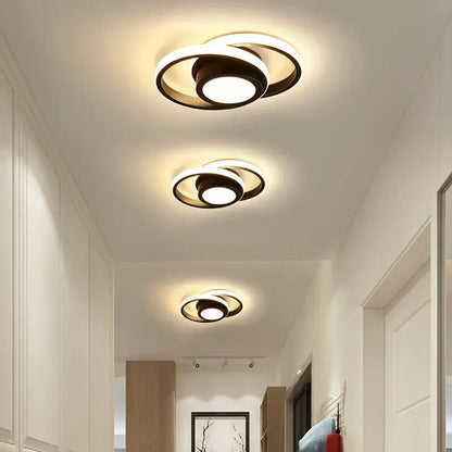 Modern minimalist black and white led ceiling lamp with sleek concentric rings for bedroom lighting decorbites led ceiling