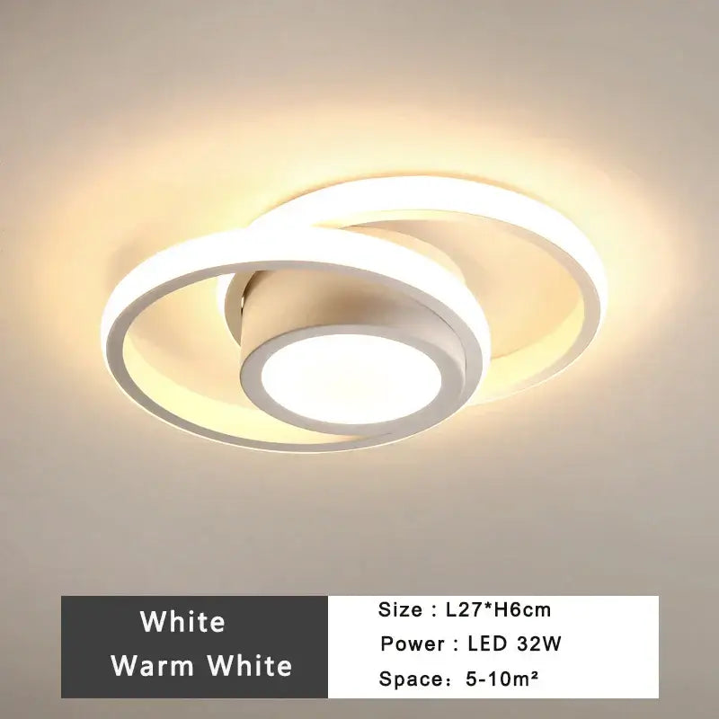 Modern minimalist black and white led ceiling lamp with two interlocking rings emitting warm white decorbites led ceiling light