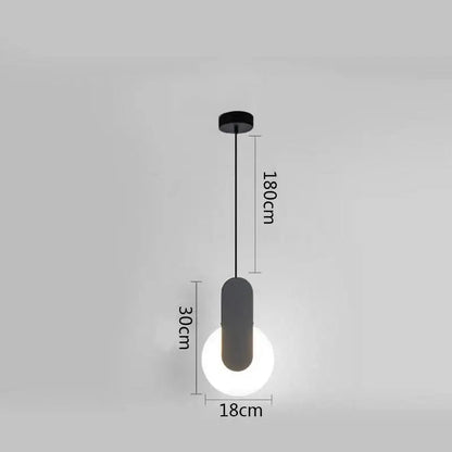 Modern minimalist pendant lamp with a sleek black ring pendant and glowing white spherical bulb for dining room decorbites black ring