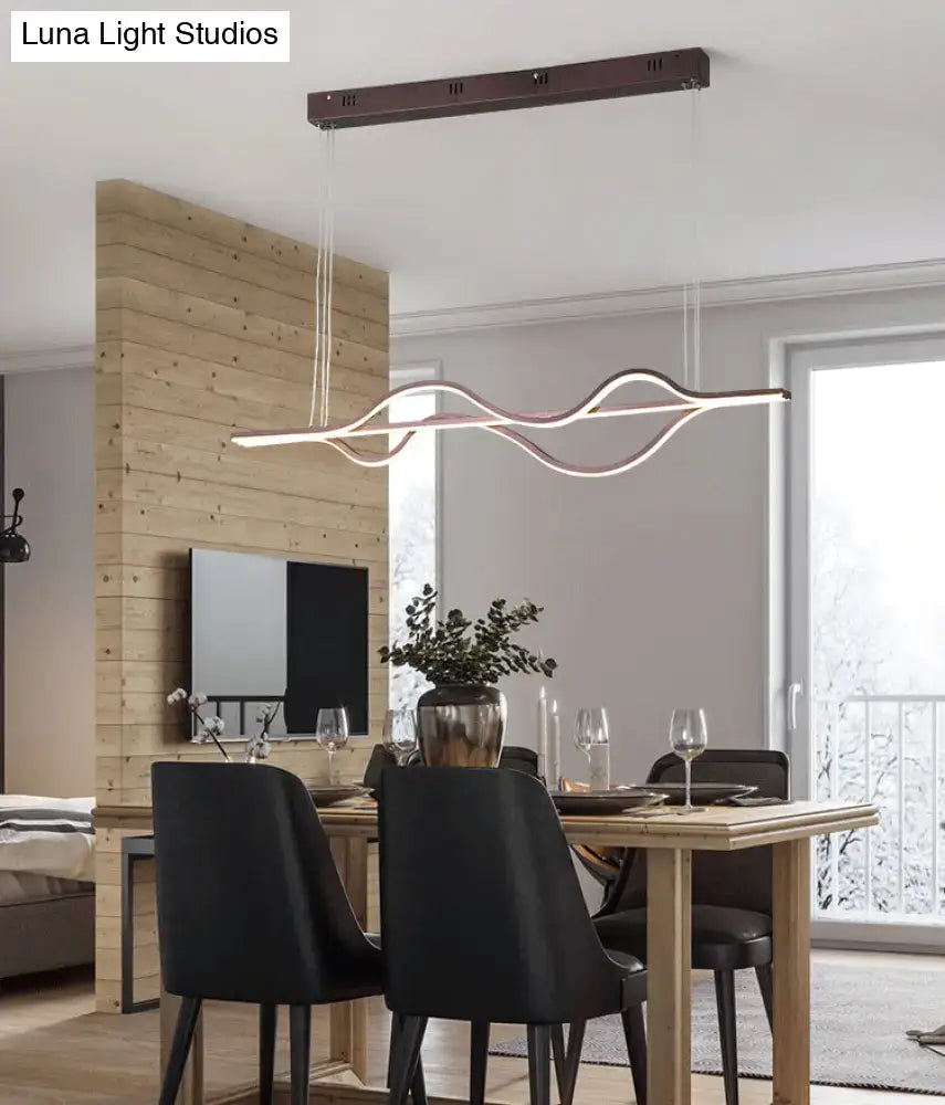 Modern minimalist black and white wave led ceiling light with copper-toned pendant and adjustable chain cord for color temperature