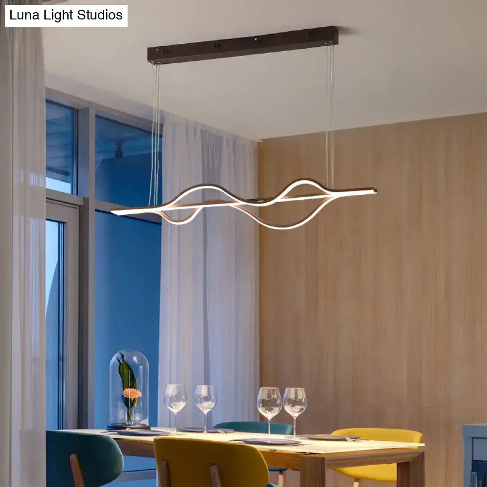 Modern minimalist black and white wave LED ceiling light with chain cord and warm color temperature for kitchen pendant use