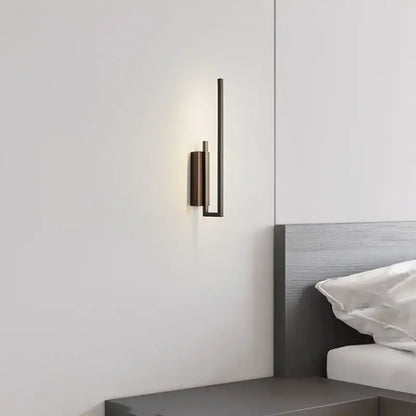 Modern minimalist wall sconce with sleek matte black finish and geometric design perfect as a decorbites brass wall sconce