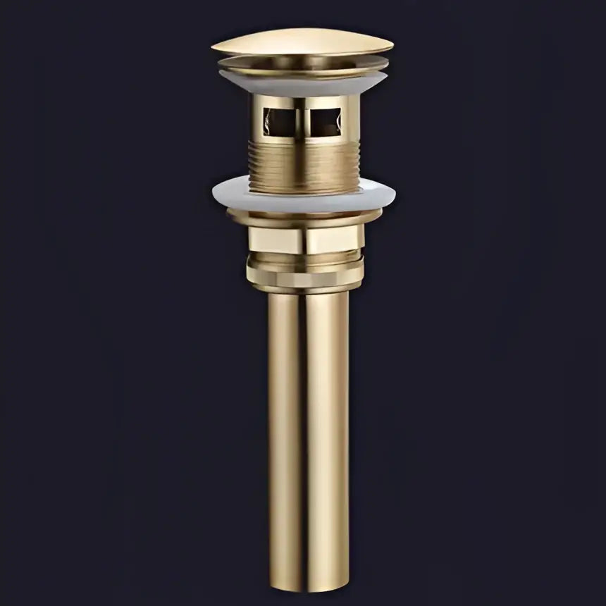 Gold-colored metal drain stopper with textured ridges for decorbites brushed gold brass widespread bathroom faucet