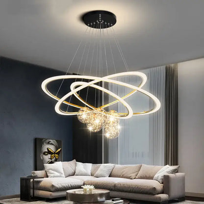 Modern minimalist decorbites circle ring pendant chandelier with gold and white rings and glowing bulbs for living room decor