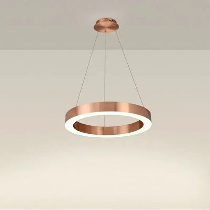 Copper-finished circular gold ring pendant light with sleek modern design for dining room decorbites circular gold decor