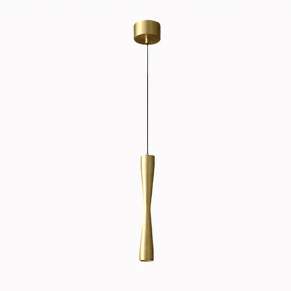 A sleek gold pendant light with a modern twisted design and minimalist cylindrical top for dining room decorbites copper black gold