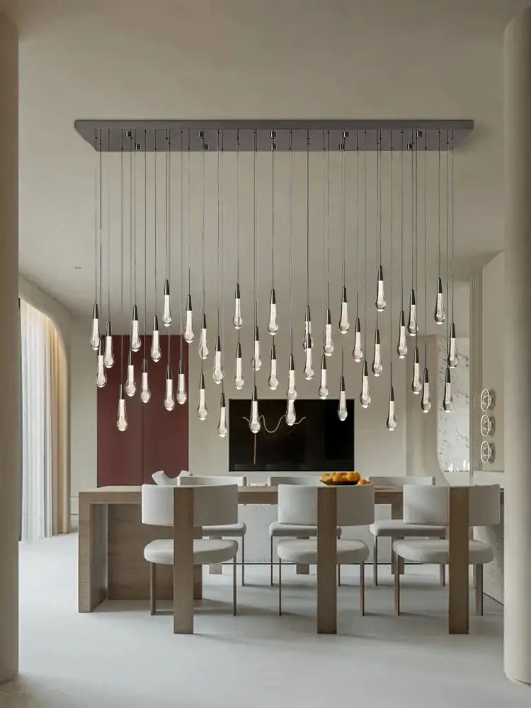 Modern minimalist ceiling chandelier with clear glass bulbs and metallic bar for dining room decorbites crystal water-drop design