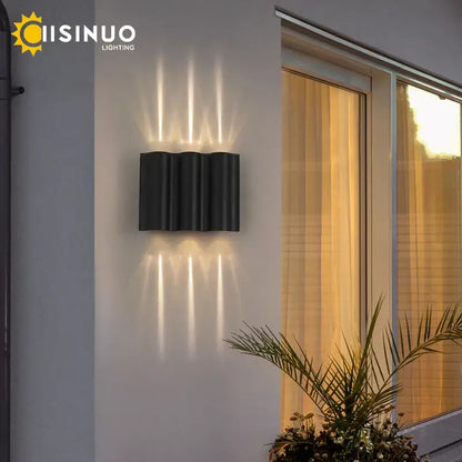 Modern minimalist decorbites 12w black outdoor sconce light with wavy design and warm led lighting for garden use