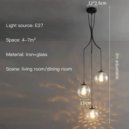 Black iron and glass decorbites glass ball pendant light with three spherical bulbs for modern minimalist decor