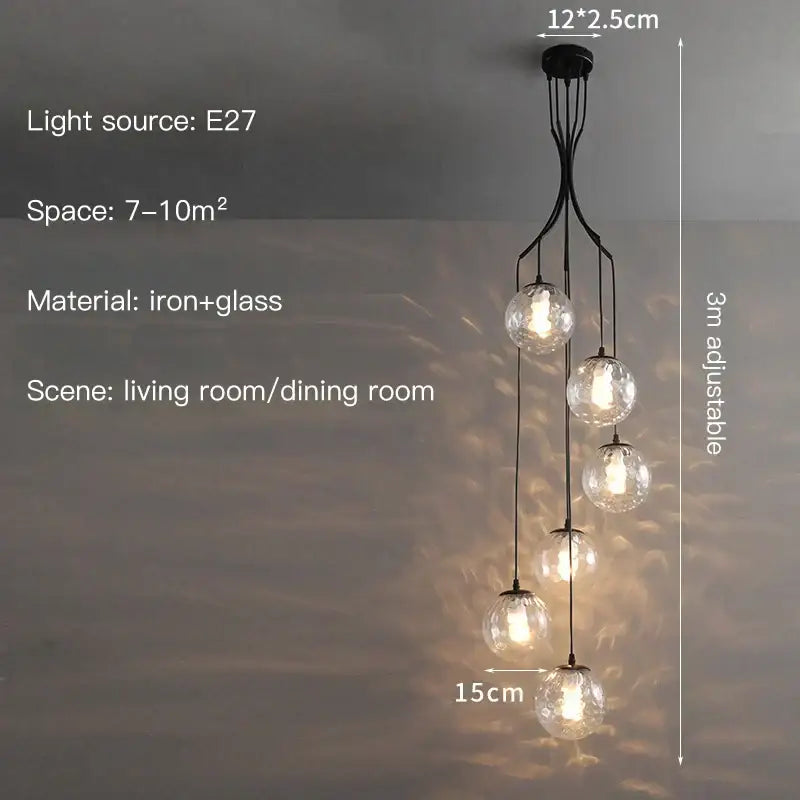 Black iron and glass decorbites glass ball pendant light with five spherical bulbs in cascading design for staircase lighting