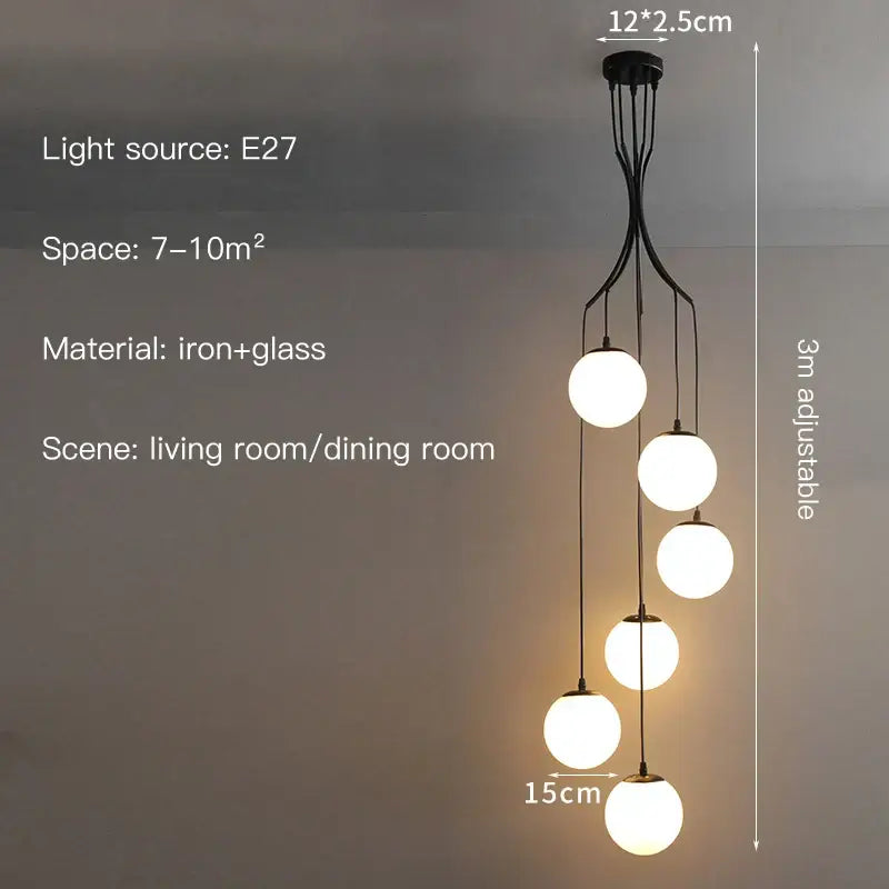 Modern black iron pendant light with five glass ball shades from decorbites glass ball chandelier collection