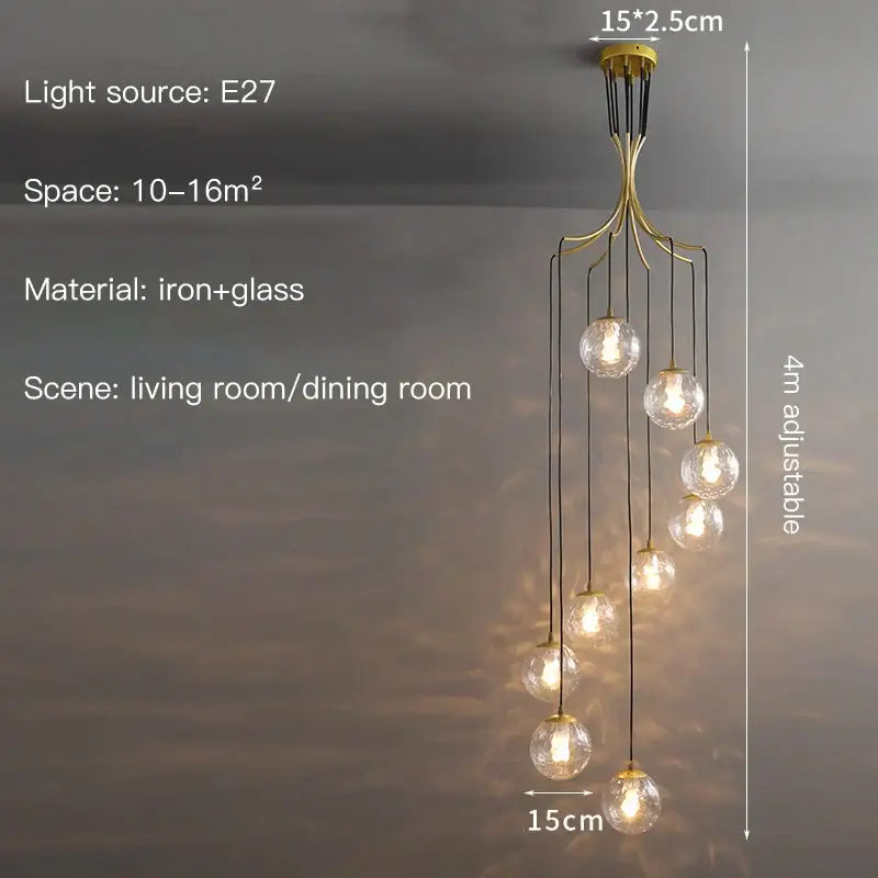 Gold-toned iron modern minimalist decorbites glass ball chandelier with multiple clear globe lights for staircase lighting