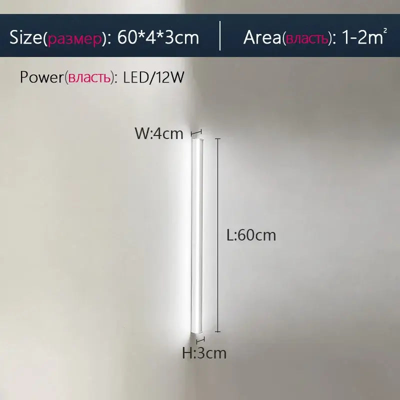 A sleek modern 60cm white led wall lamp with minimalist cylindrical design for decorbites elegant black bedroom decor