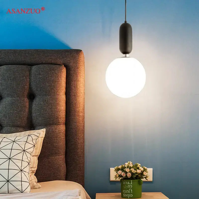 Modern minimalist black and gold pendant lamp with frosted glass ball led bulb for bedroom decorbites glass ball