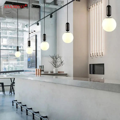 Modern minimalist black and gold pendant lamp with spherical glass shades for bedroom decorbites glass ball led lighting