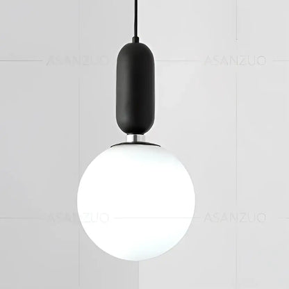 Modern minimalist glass ball led pendant lamp with matte black cylindrical top and frosted white globe for bedroom decorbites