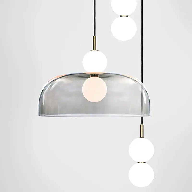 Modern minimalist pendant light with translucent gray glass ball shade and white bulbs for living room decorbites glass ball