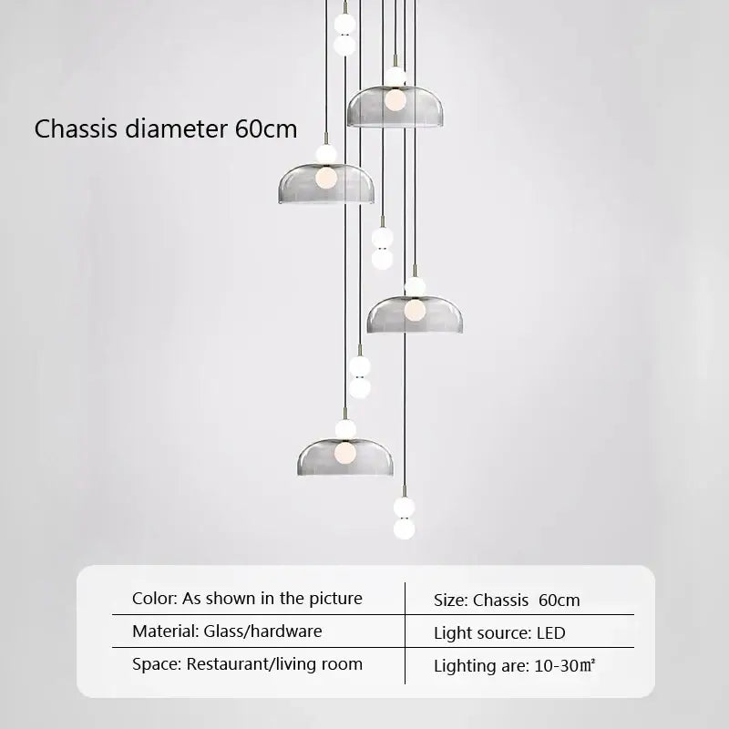 Modern minimalist pendant light with tiered translucent gray glass ball shades and sleek metallic hardware for living room decorbites glass ball