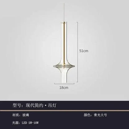 Modern minimalist glass pendant light with clear blue-green tint and gold-toned metal accents for kitchen hanging lamp