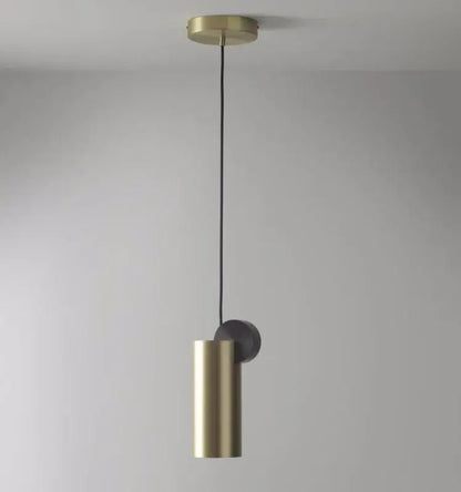 A modern minimalist golden led pendant light with brass cylindrical body and matte black accent for dining room decorbites