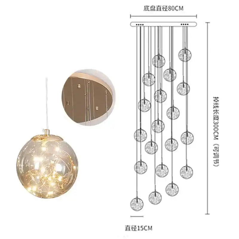 Modern minimalist gold decorbites glass chandelier featuring a clear glass globe with warm led fairy lights