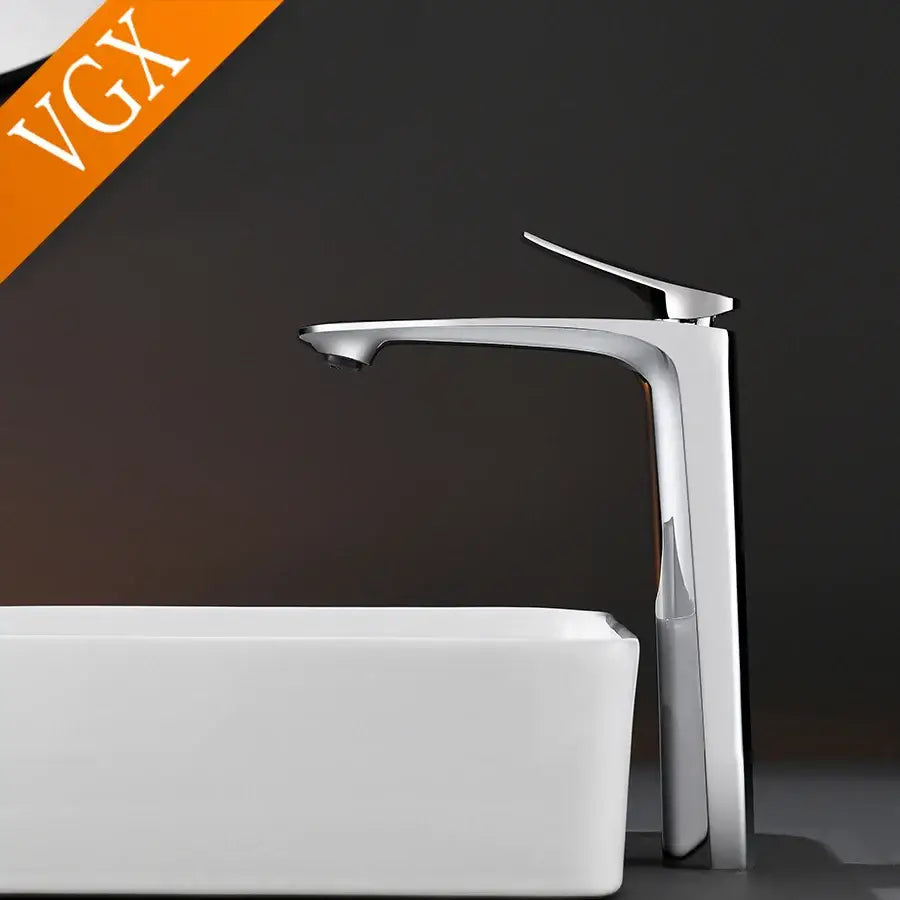 Modern chrome-finished high basin mixer faucet with sleek minimalist design for cold water in bathrooms