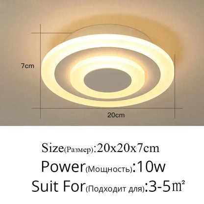 Modern minimalist gold led ceiling light with circular curved arms and concentric rings emitting warm soft glow decorbites led ceiling