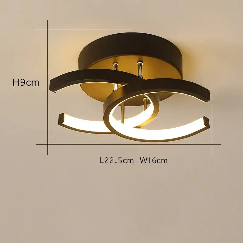 Modern minimalist black and gold decorbites led ceiling light with sleek curved arms for living room decor