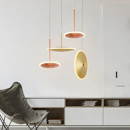 Modern minimalist gold led pendant light with warm copper and gold disc shades for kitchen island decorbites gold led pendant