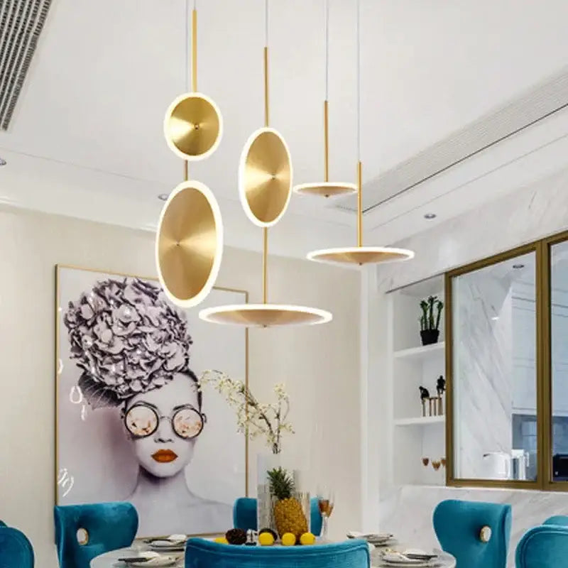 Modern minimalist gold led pendant light with gold-toned circular design for kitchen island decorbites pendant light