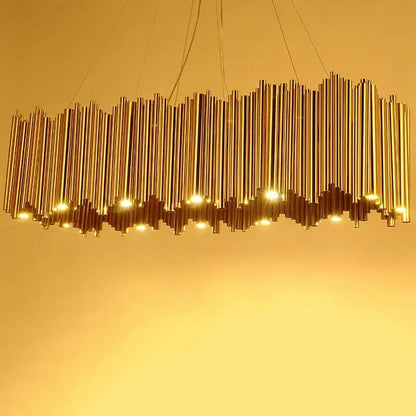 Modern minimalist gold stainless steel chandelier with wavy vertical rods and embedded lights for living room decorbites gold stainless