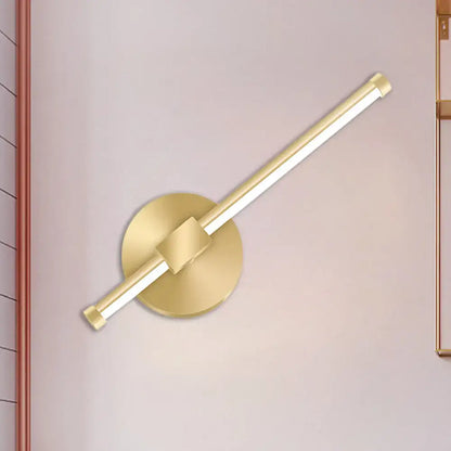 Modern minimalist gold tube stick wall sconce with sleek cylindrical light bar on circular base for bedroom LED lighting