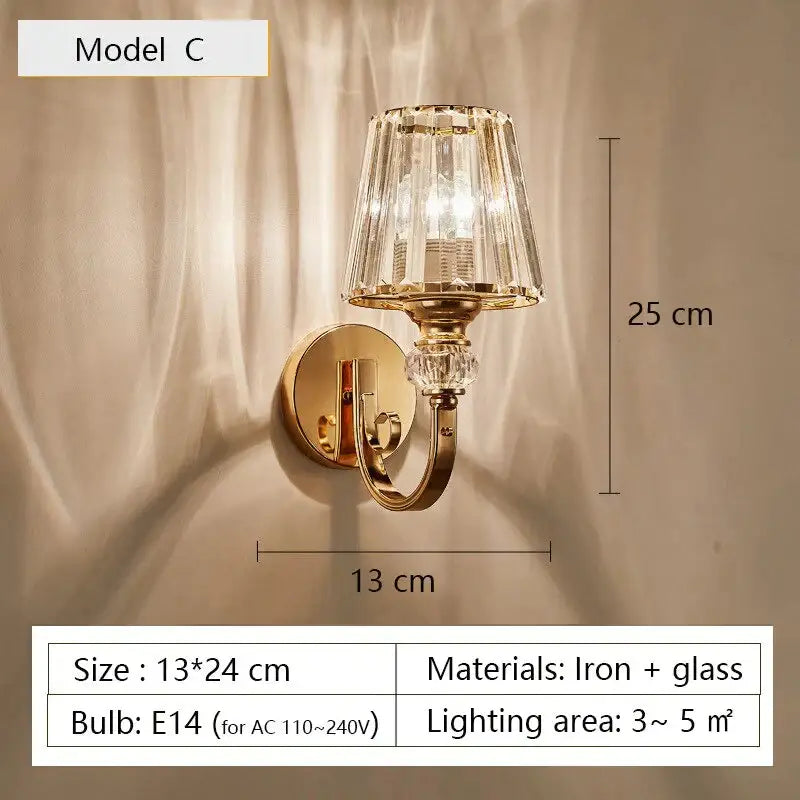 Modern minimalist gold wall lamp with faceted crystal glass shade and decorative crystal accents for bedroom use