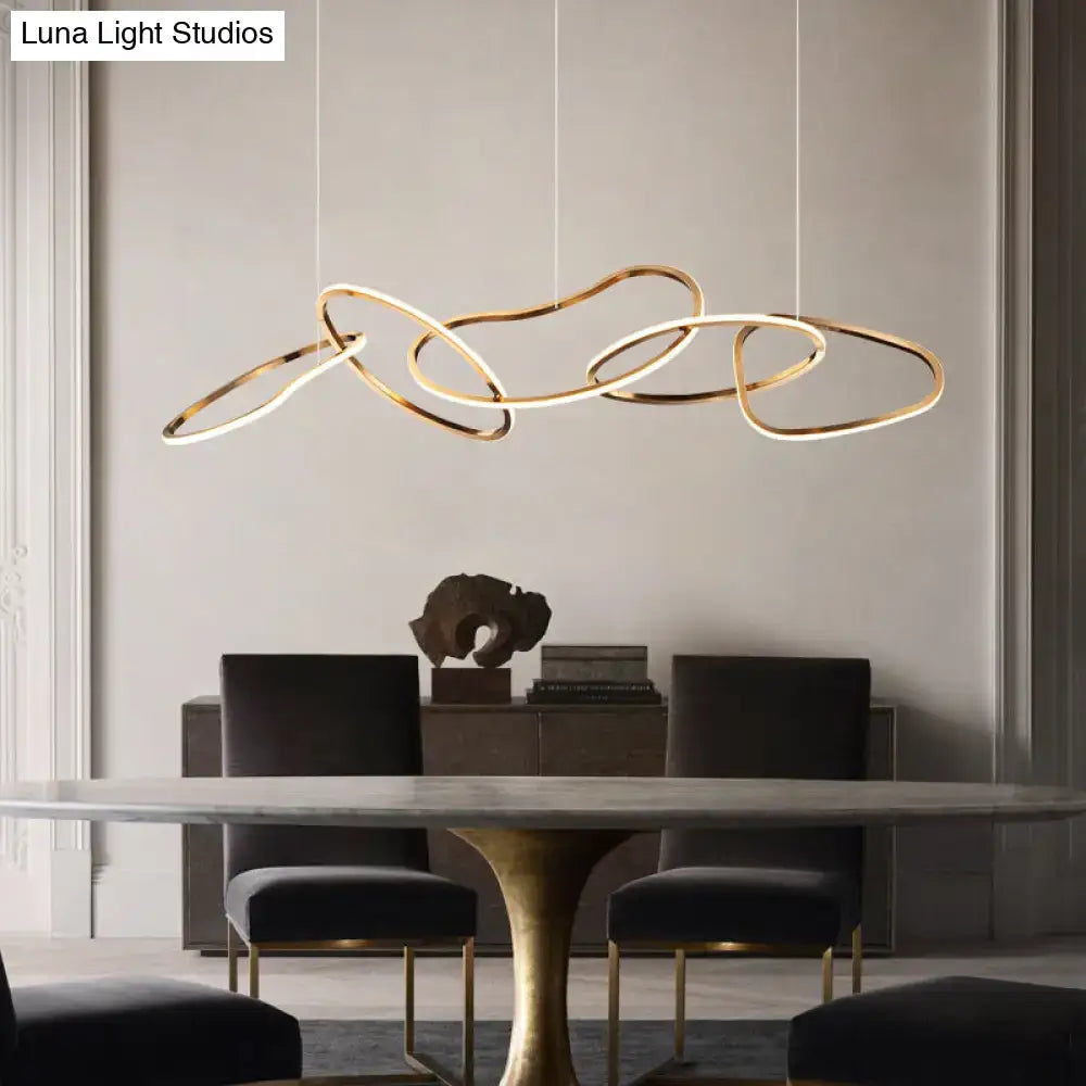 Modern minimalist golden led hanging light with gold-toned interlocking rings and integrated led for dining room