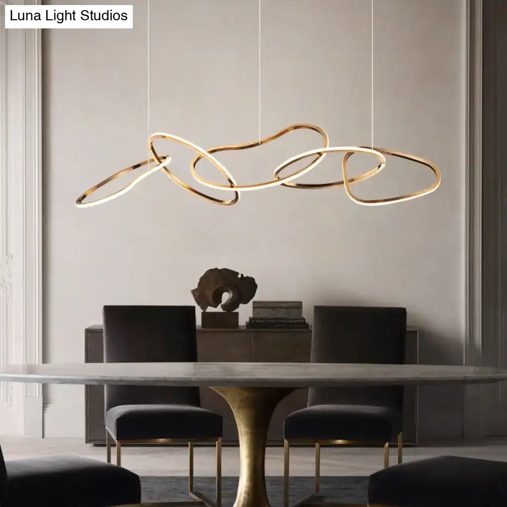 Modern minimalist golden led hanging light with interlocking circular rings for dining room illumination