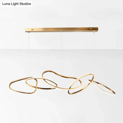 Modern minimalist golden led hanging light with sleek interlocking rings and rectangular ceiling mount for dining room