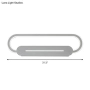 Modern minimalist gray oval led wall sconce with acrylic oval led design and matte finish for bedroom lighting