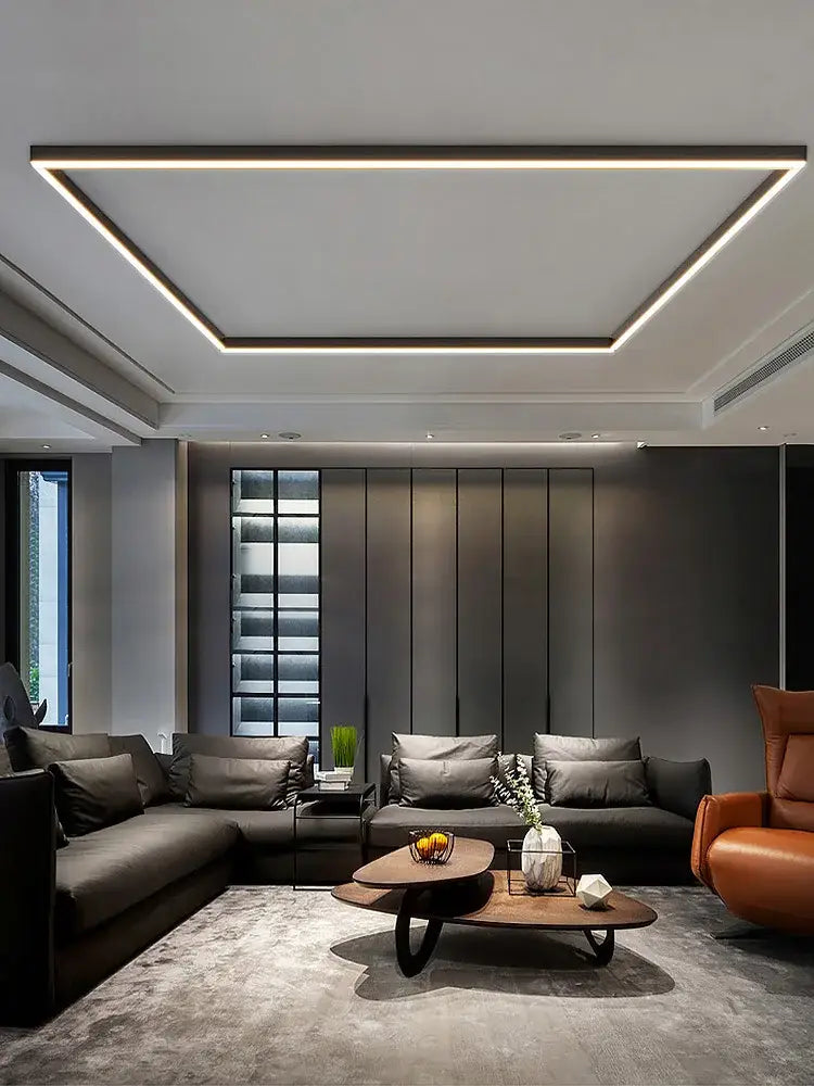 Modern minimalist linear led ceiling light with sleek dark wood coffee table and black metal legs for living room decorbites led ceiling