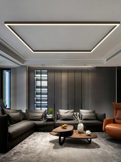 Modern minimalist linear led ceiling light with sleek dark wood coffee table and black metal legs for living room decorbites led ceiling